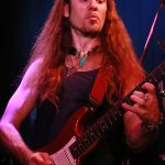 Ulrich Ellison (red guitar)