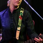 Ali Coyle (bass, backing vocals)