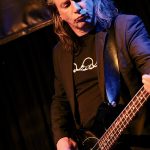 Martin Hofpower (bass, backing vocals)