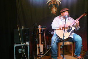 Kevin Burt (vocals, acoustic guitar, cigar box guitar, harmonicas)