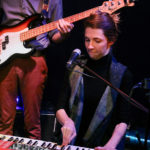 Alexandra Sinclair (vocals, keyboard)