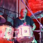 Mel Gaynor (drums, vocals, backing vocals)