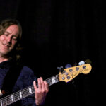 Tom Swann (bass, backing vocals)