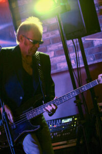 Martin Engelien (bass, backing vocals)