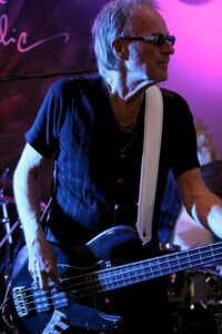 Martin Engelien (bass, backing vocals)