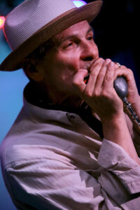 R.J. Mischo (vocals, harmonicas)