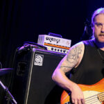 Leigh Miller (bass, backing vocals)