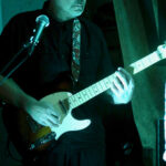 Peter Cladders (electric guitar, marimba, background vocals)