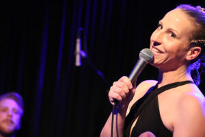 Tina Jobson (vocals, backing vocals)