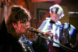 Ruth Lyon (vocals, violin, percussion)