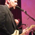 Mike Titré (Gesang, Gitarre, Harp, Bass)