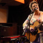 Kaz Hawkins (vocals, acoustic guitars)