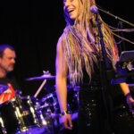 Tina Jobson (vocals, percussion)