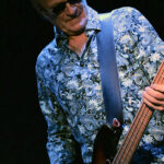 Martin Engelien (bass, backing vocals)