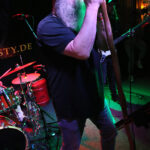 Robert Collins (lead vocals, harmonica)