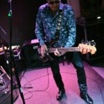 Martin Engelien (bass, backing vocals)