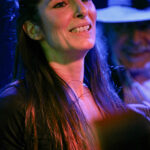 Stella Tonon (lead vocals)