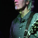 Michael Dommers (electric guitars, slide guitar, backing vocals)