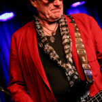 Martin Engelien (bass, backing vocals)