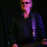 Martin Engelien (bass, backing vocals)