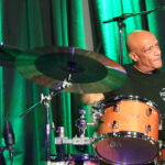 Mel Gaynor (drums, vocals, backing vocals)