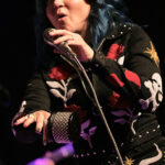 Greta Valenti (lead vocals, percussion)