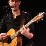 Niels Goudswaard (vocals, acoustic guitar, harmonica, backing vocals)
