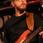Marcus Porter (bass, backing vocals)