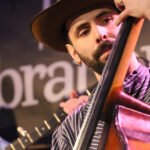 Tomás Peralta (lead vocals, acoustic guitar, mandolin, Dobro, upright bass, backing vocals)