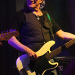 Martin Engelien (bass, backing vocals)