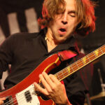 Kevin Clerence (bass, backing vocals)